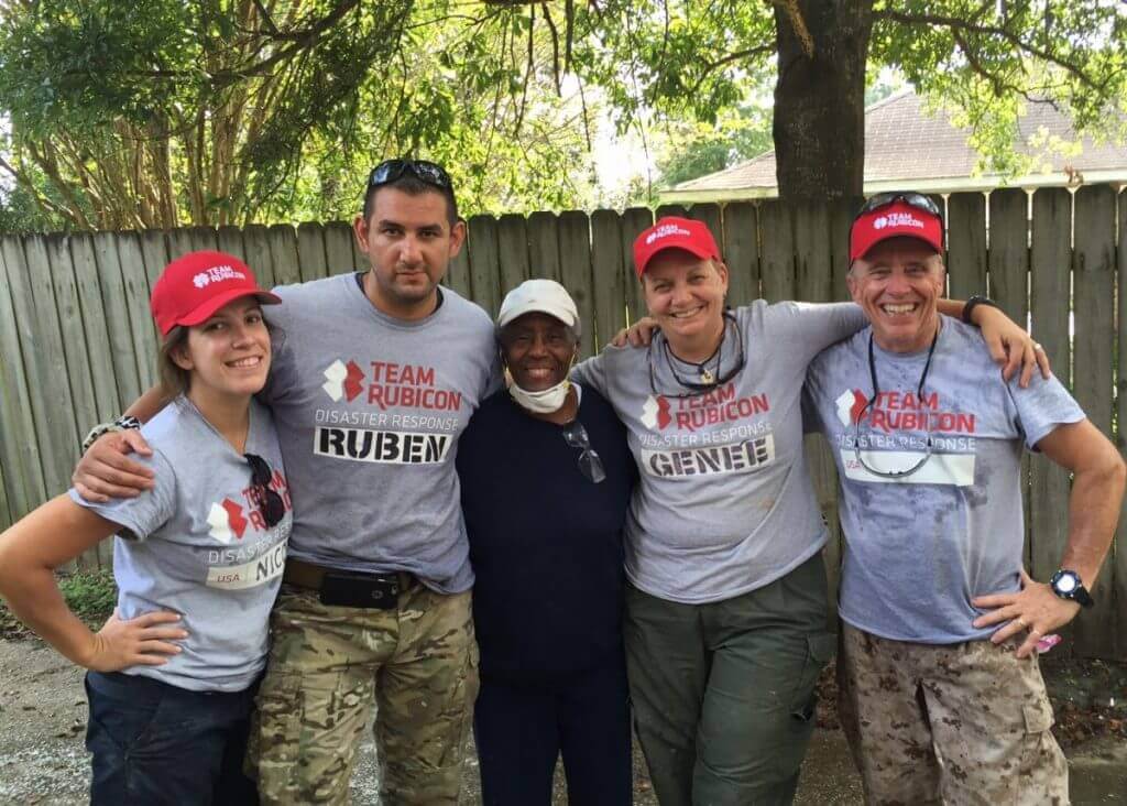 Nicole (far left) with her strike team and homeowner Alberta Washington. 