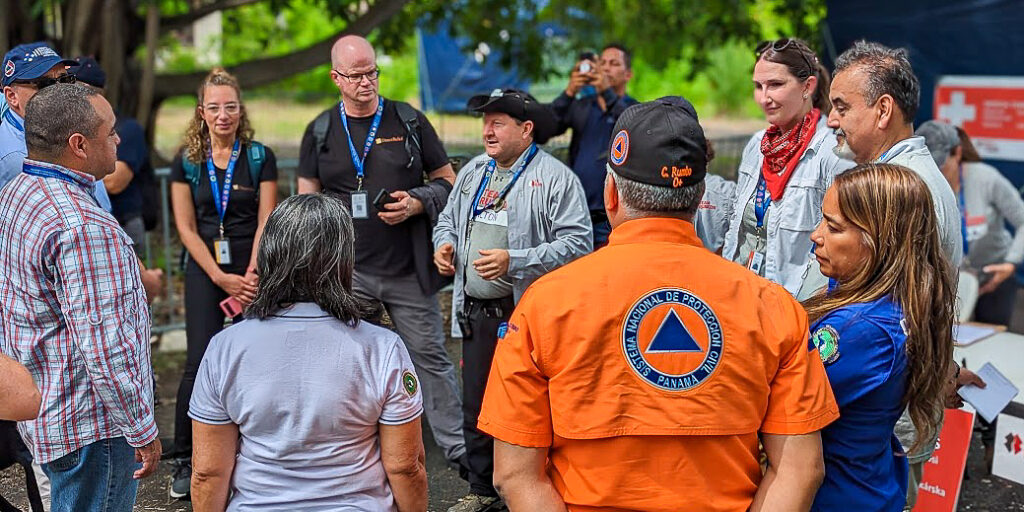 Volunteers standing in a circle