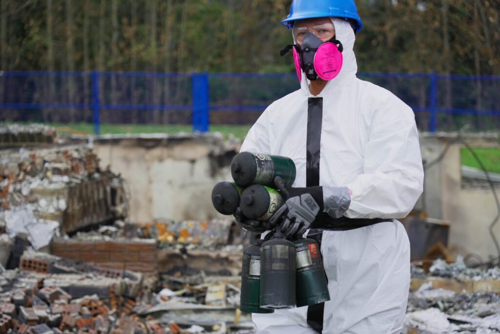 Cleaning Up After Fire in tyvek suit