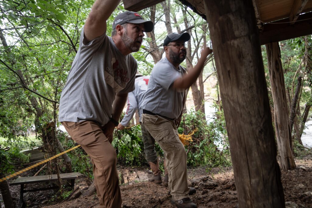 Volunteers helping with debris removal in Hill Country - part of a real Texas flood survivor story