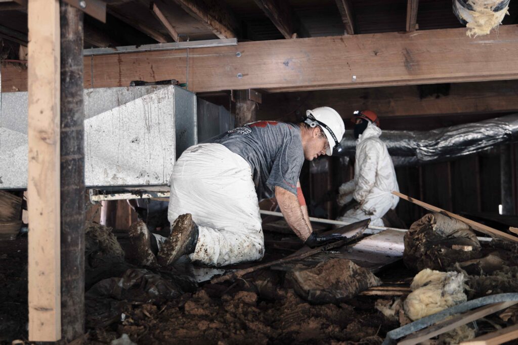 Team Rubicon volunteers supporting a Texas flood survivor family in the Hill Country.