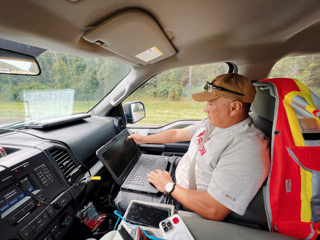 GIS disaster response volunteer asseses damage in the field